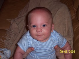 Mon Sep  5 19:13:31 2005

I like to hang out with Dad when he gets home from work each day.  Mom snapped a picture on this evening.