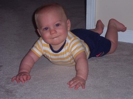 Sat Jan  7 15:15:16 2006

Still not really crawling very well, but can scoot pretty well after things that I really want...  and am pulling up to a standing position.  Will I walk before I crawl!?