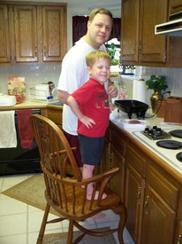 Sat 09 May 2009 06:19:30 PM

Dad and Andrew cooking hamburgers for dinner.
