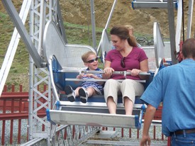 Thu 30 Jul 2009 12:33:26 PM

Andrew and mom board the ferris wheel.