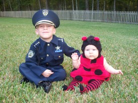 Sat 31 Oct 2009 05:51:07 PM

Andrew Trick-or-Treated this year with Mom taking pictures and Dad pushing Gracie's stroller.  Andrew was a police officer and Gracie a lady bug.