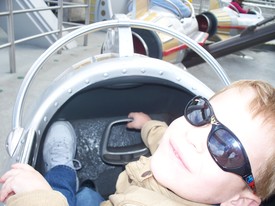 Sat 06 Feb 2010 11:37:34 AM

Dad took this photo from the seat behind Andrew, on the space needle ride in Tomorrowland.