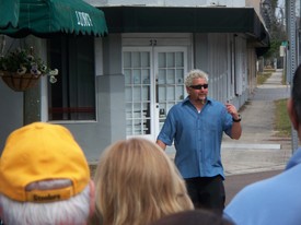 Wed 24 Feb 2010 12:02:22 PM

That is Guy Fieri, one of Andrew's favorite TV personalities... and this is about as close to him as we got.   :(