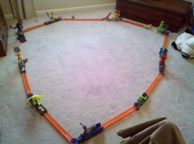 Sun 26 Dec 2010 10:01:43 AM

Andrew and Dad setup a hot wheels track that Nana and Papa got for him.