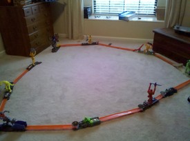Sun 26 Dec 2010 10:07:08 AM

Andrew and Dad setup a hot wheels track that Nana and Papa got for him.