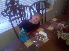 Mon 18 Jul 2011 07:28:28 PM

Andrew poses before enjoying a couple of diabetic-friendly peanut butter cup mimics that mom made for him. Diabetes is no fun, but life still can be.