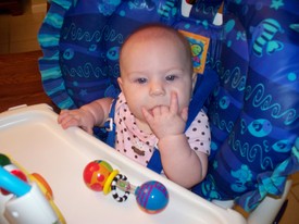 Fri 28 Aug 2009 08:24:48 PM

This seems to be Gracie's favorite pacifier -- her two middle fingers...  Rock on!