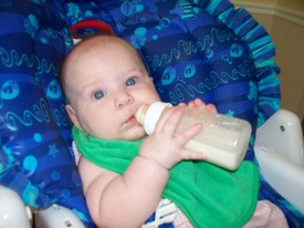 Thu 03 Sep 2009 01:00:14 PM

Mom staged this picture; Gracie is not really holding her own bottle quite yet.