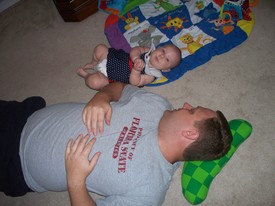 Sun 13 Sep 2009 01:42:25 PM

Gracie has really started warming up to dad more and more, recently.