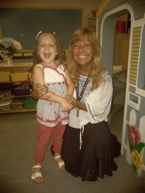 Thu 15 Aug 2013 11:17:57 AM

Gracie with her Pre-K4 teacher on orientation day.